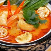 Tom Yum Soup · Shrimp, clam fish cake, veggie in Thai style.