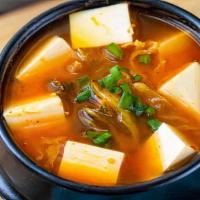 Kimchee Tofu Soup · Spicy pickled veggie with tofu.