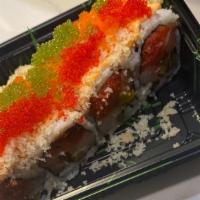 Volcano Roll · In: spicy tuna, salmon, yellowtail and jalapeño out: spicy mayo,crunch and tobiko.