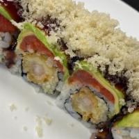 Spicy Tunami Roll · In: shrimp tempura and cucumber out: spicy crunch tuna and avocado with eel sauce and crunch.