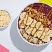 Almond Acai Bowl-Acai Topped With Bananas, Granola, Almond Butter, And Almonds. · Refreshing acai topped with bananas, granola, almond butter, and almonds.