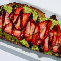 Strawberry Avocado Toast-Smashed Avocado On Whole Wheat Toast Topped With Strawberries And Balsamic. · Smashed avocado on whole wheat toast topped with strawberries and balsamic.