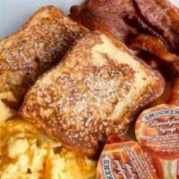 Combo 6 · French toast, choice of bacon or sausage, two eggs.
