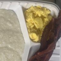 Combo 3 · Bacon, grits, two eggs, choice of white or wheat toast.