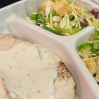Chicken Caesar · Fresh chicken breast served with romaine lettuce and Parmesan cheese and Caesar dressing.