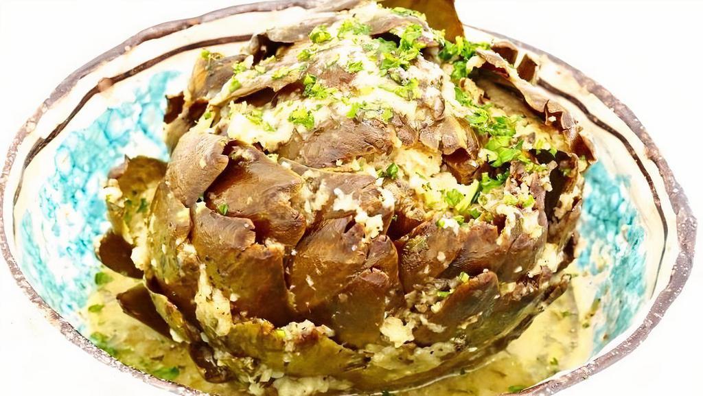 Carciofo Ripieno · Whole artichoke stuffed with bread crumbs, parmesan, . garlic, parsley