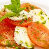 Caprese Salad · Buffalo mozzarella, tomato, basil