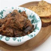 Caponata · Eggplant, celery, green olives, capers, onions and tomato in sweet and savor, crostini bread