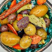 Olive “Cunsate” · Mix marinated olives, garlic, oregano, celery, parsley