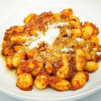 Gnocchi Bolognese · Home made potato “Gnocchi” with pork and beef ragout