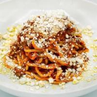 Tagliolini Lamb · Home made spaghetti with braised lamb, served with crambled goat cheese