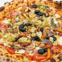 Pizza Capricciosa · Fresh candy tomatoes, mozzarella, ham, mushrooms, artichoke hearts moroccan olives, parsley