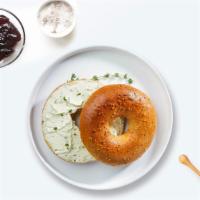 Cheesy Glam Bagel · Toasted bagel topped with cream cheese.