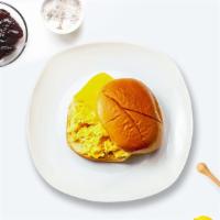 Eggs & Cheese Combo Sandwich · Scrambled egg and cheddar cheese served with your choice of bread.