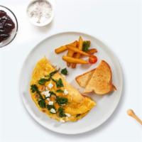 Spinning Spinach & Feta Omelette · Eggs cooked with bacon and tomatoes as an omelette. Served with a side of home fries and toa...