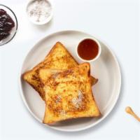 Fancy French Toast · (Three slices) Fresh bread battered in egg, milk, and cinnamon cooked until spongy and golde...