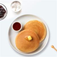Pancakes & 2 Eggs · Fluffy pancakes cooked with care and love served with butter and maple syrup. Served with tw...