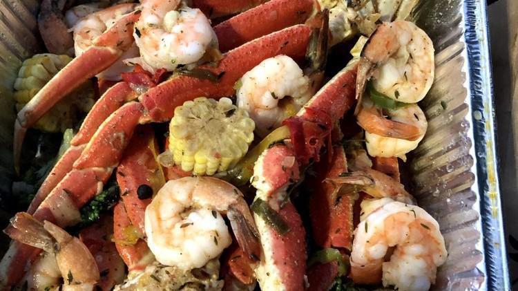 Seafood Platter (Seafood Boil) · Lobster tail, crab legs, shrimp, mussels seasoned and served with fresh vegetables.