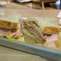 Ultimate Ham Sandwich · ham, baconnaise, brie, sliced apples, Fritz's frizzles & lettuce on our seed bread.