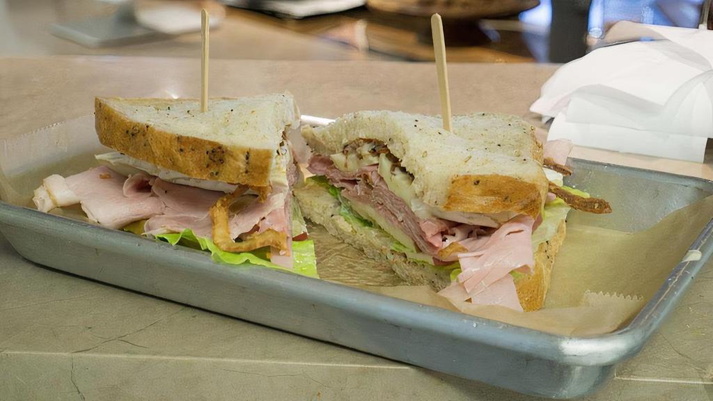 Ultimate Ham Sandwich · ham, baconnaise, brie, sliced apples, Fritz's frizzles & lettuce on our seed bread.
