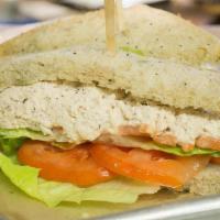 Tuna Salad Sandwich · solid white albacore tuna salad with lettuce & tomatoes on our seed bread.