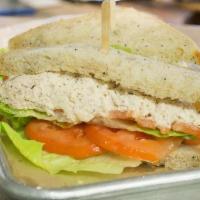 Chicken Salad Sandwich · white meat chicken salad with lettuce & tomatoes on our seed bread.