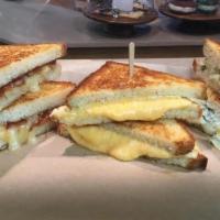 Grilled Cheese · our five cheese blend on toasted white bread. Vegetarian.