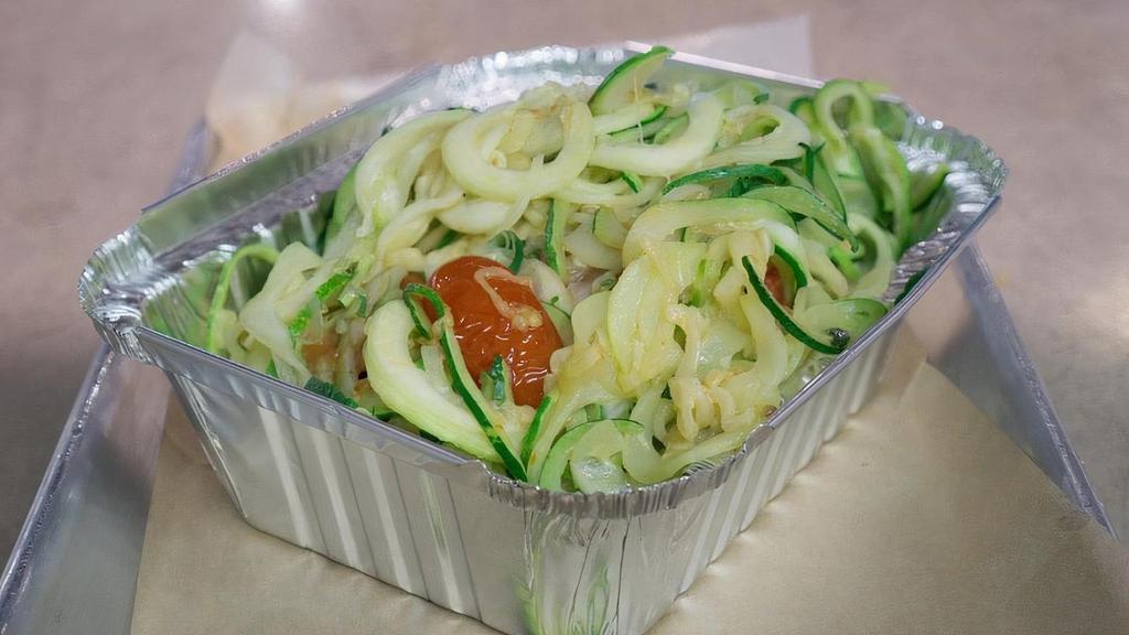 Roasted Tomato Zoodles · zucchini noodles with roasted grape tomatoes, garlic & mozzarella. Vegetarian or Vegan without cheese.
