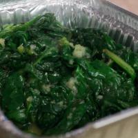 Sautéed Spinach · with olive oil & garlic. Vegan.