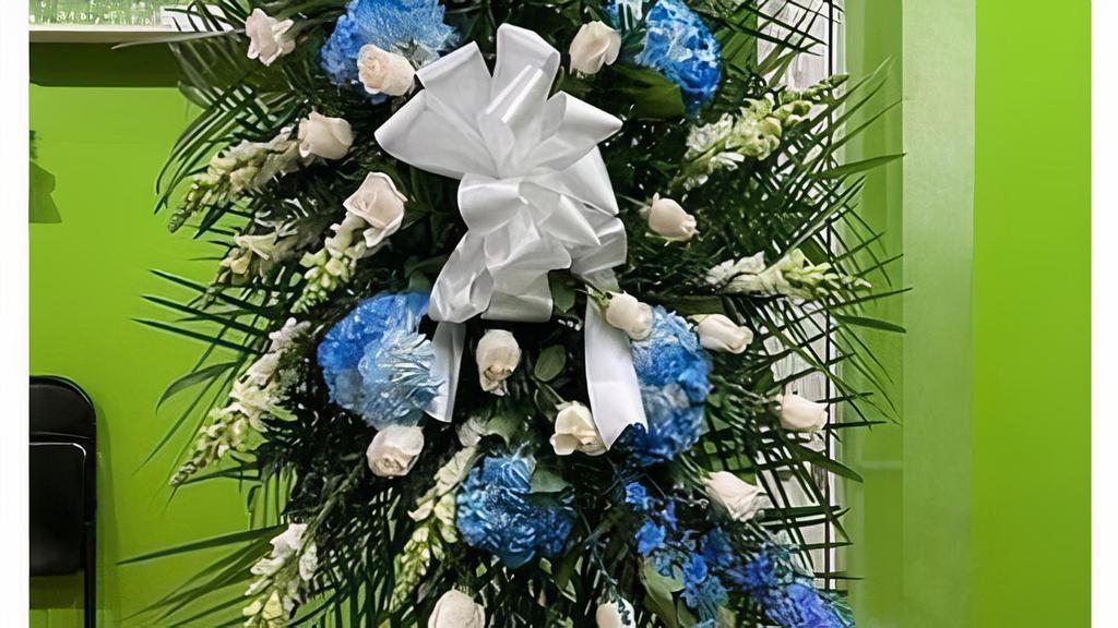 Blue Funeral Wreath · Blue color only. Our beautiful funeral wreaths come in a variety of sizes & flowers (prices may vary depending on selection).