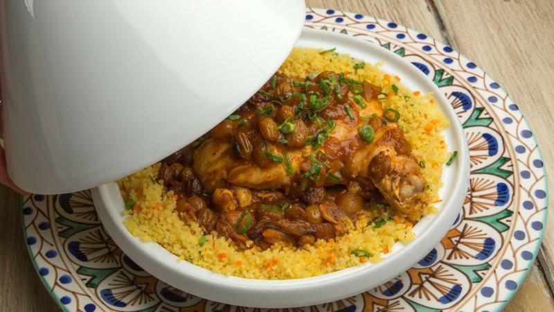 Moroccan Chicken Tajine · Goffle farm free-range braised chicken, couscous, eggplant, preserved lemon apricots and currants.