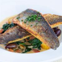 Sautéed Branzino · Tomato, spinach, capers, olives, fingerling tomatoes, sherry wine and lemon.