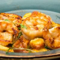 Homemade Ricotta Gnocchi · Jumbo shrimp, oyster mushrooms, sun-dried tomatoes, olives, spinach and sherry wine-lemon sa...