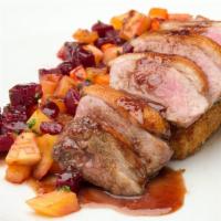 Long Island Duck · Coriander crusted duck breast, mixed root vegetables, crispy polenta cake and an apple pomeg...