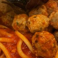 Con Polpette · Sautéed in plum tomato sauce with tiny homemade baby meatballs.