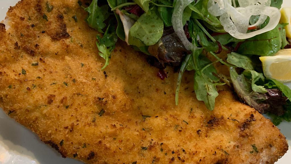 Pork Chop  Milanese · French cut bone in pork chop breaded & fried served with mixed green salad topped with grana padana cheese