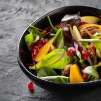 Orange Pear Salad · Fresh salad made with Oranges, pears, walnuts and Gorgonzola over a mesclun salad. Served wi...
