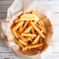 French Fries · Delicious French fries deep fried 'till golden brown, with a crunchy exterior and a light fl...