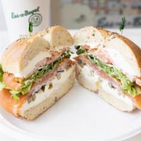 A Signature Favorite · Slices of Nova on a Bagel w/Scallion Cream Cheese, Freshly Sliced Tomato, Lettuce, Onions & ...