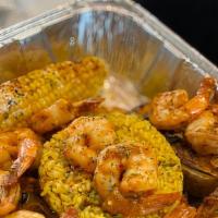 Shrimp Dinner · 20 jumbo shrimp, corn, rice , veggies and potatoes.
