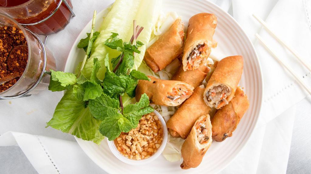 Spring Rolls (Poh Pia) · Popular. Deep fried egg rolls filled with mince pork, long rice, mushroom, carrots, onions, and taro wrapped in egg paper. Served with house vinaigrette dipping sauce.