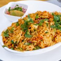 Pulav · Basmati rice with signature spices and vegetables.