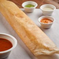 Masala Dosa · Rice and lentil crepe filled with potatoes, onions and spices.