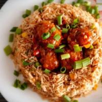 Fried Rice With Manchurian · Fried rice mixed with veg & manchurian balls