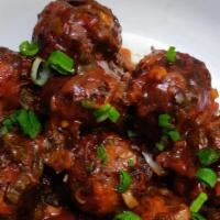 Manchurian (Dry) · Vegetable fried dumplings tossed with onion, garlic, ginger and chinese flavored spices