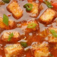 Paneer Chilli (Gravy) · Cottage cheese and green pepper tossed with onion & garlic gravy