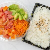 High Tide Poke Bowl · Salmon, tuna and kani drizzled with sweet sauce and spicy mayo topped with cucumber, carrot ...