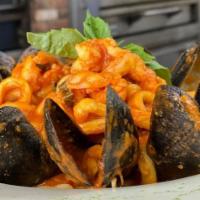 Mussels · Choice of white or red sauce.