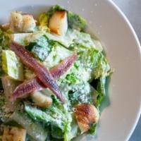 Caesar · Romaine | white anchovy | parmesan | lemon & anchovy vinaigrette | herb croutons.