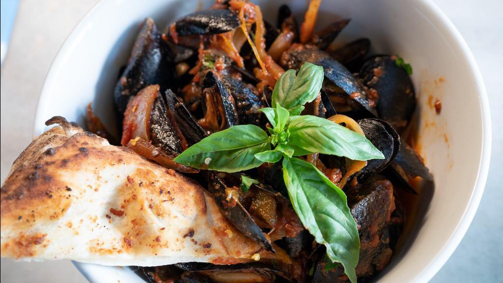 Mussels · French mussels in white wine and herbs or marinara garlic hot sauce.